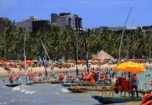 Infectologista alerta sobre risco de transmissão da Covid-19 na praia; veja quais são os cuidados